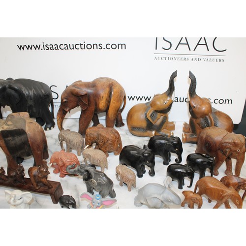 90 - A Large Quantity Of Mixed Wooden, Ceramic Etc Elephants, Tallest 23cm Various Conditions As Found CO... 