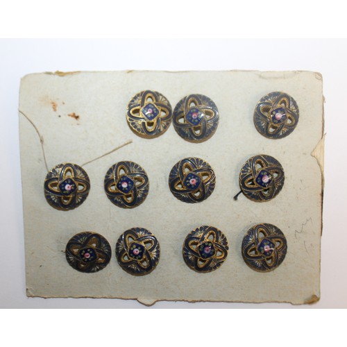 103 - A Card Containing 11 Decorative Antique Enamelled Buttons