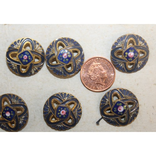 103 - A Card Containing 11 Decorative Antique Enamelled Buttons