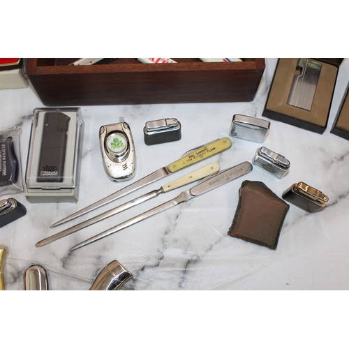 108 - A Box Containing, Lighters, Pocket Knives And Letter Openers AS Found All Untested