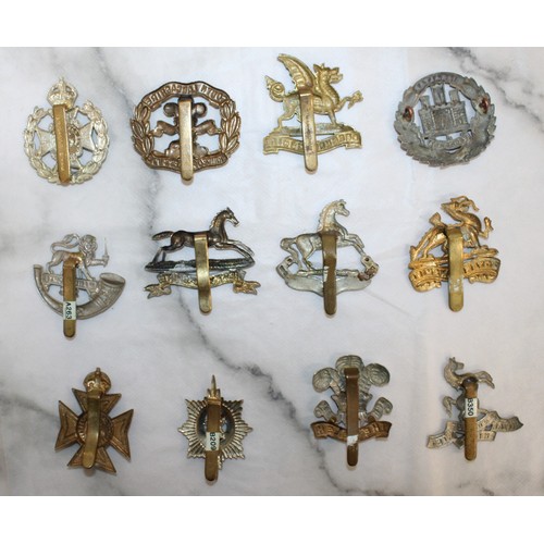 238 - A Selection Of Collectable Military Cap Badges - As Found