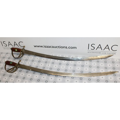 69 - 2 x Collectable Ceremonial Swords-Made In India Longest: 95cm
COLLECTION ONLY MUST BE OVER 18 ID ON ... 