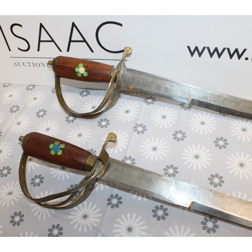 69 - 2 x Collectable Ceremonial Swords-Made In India Longest: 95cm
COLLECTION ONLY MUST BE OVER 18 ID ON ... 