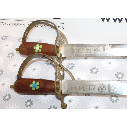 69 - 2 x Collectable Ceremonial Swords-Made In India Longest: 95cm
COLLECTION ONLY MUST BE OVER 18 ID ON ... 