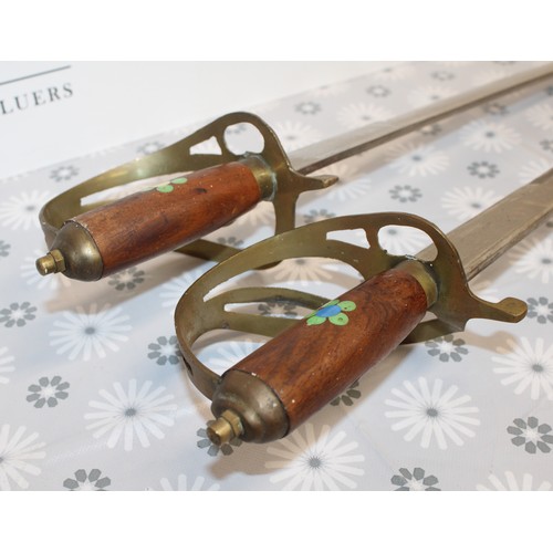 69 - 2 x Collectable Ceremonial Swords-Made In India Longest: 95cm
COLLECTION ONLY MUST BE OVER 18 ID ON ... 