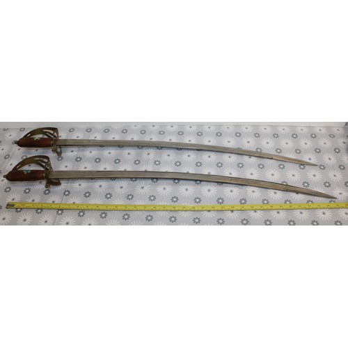 69 - 2 x Collectable Ceremonial Swords-Made In India Longest: 95cm
COLLECTION ONLY MUST BE OVER 18 ID ON ... 