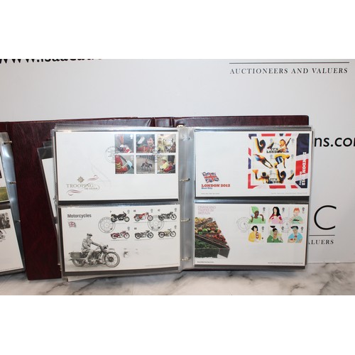 279 - 4 x The Royal Mail First Day Cover Albums Containing A Quantity Of As Found