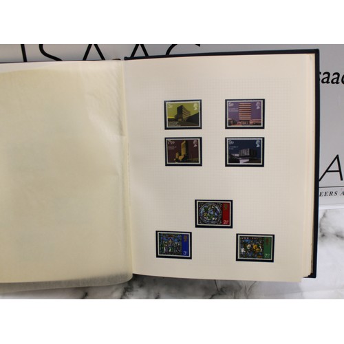 296 - An Album Of Unfranked (A Few Franked)Worldwide Stamps