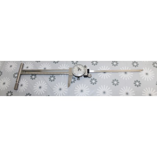 1 - A Mitutoyo Dial Caliper A High Precision Instrument Used By Machinists And Engineers To Measure The ... 