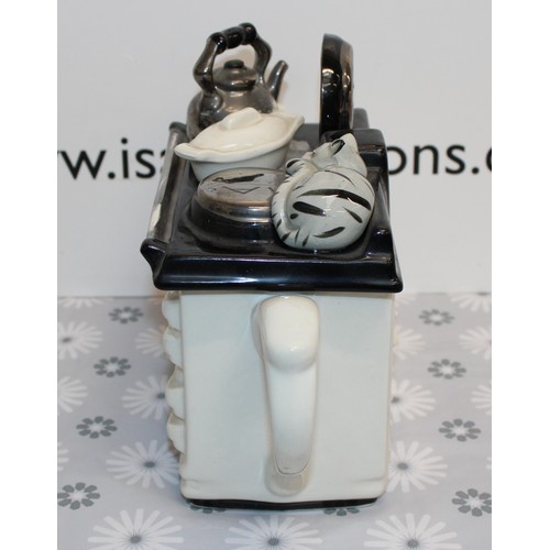 219 - COLLECTABLE LARGE AGA STYLE TEAPOT WITH SLEEPY CAT 30CM X 19.5CM
THE TEAPOTTERY
COLLECTION ONLY