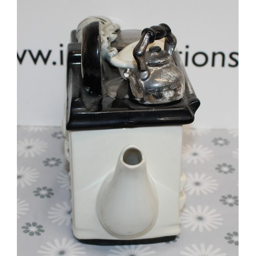 219 - COLLECTABLE LARGE AGA STYLE TEAPOT WITH SLEEPY CAT 30CM X 19.5CM
THE TEAPOTTERY
COLLECTION ONLY