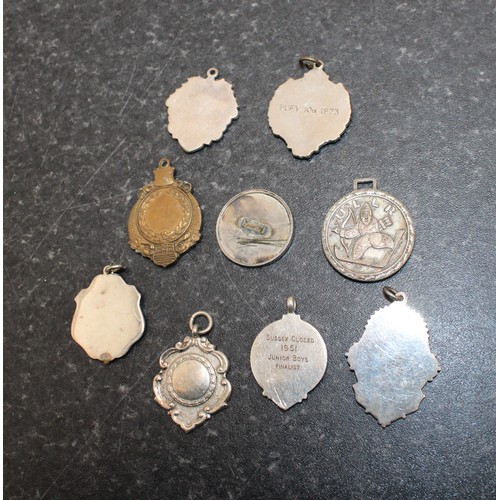 236 - A Selection Of Collectable Sporting Fobs As Found