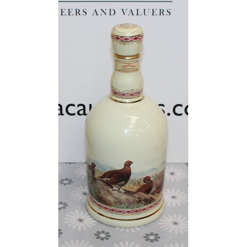 284 - 1 x Bottle Boxed The Famous Grouse Highland Decanter Finest Scotch Whisky 70cl 40% 1980's Collection... 