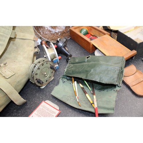 235 - A Selection Of Fishing Items Including: Floats/Line And Reels Etc Inside A British Army Canvas Bag A... 