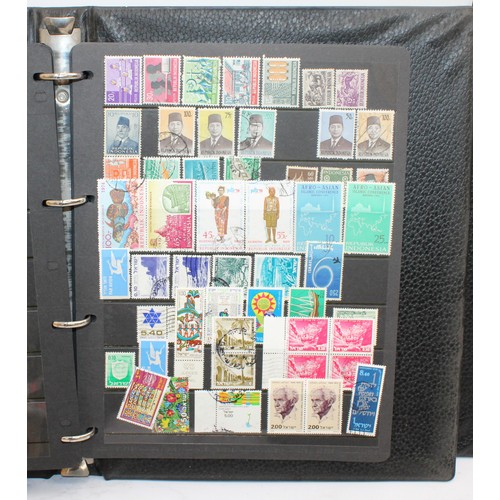 220 - 4 x Worldwide Stamp Albums Containing Franked And Unfranked Stamps AF