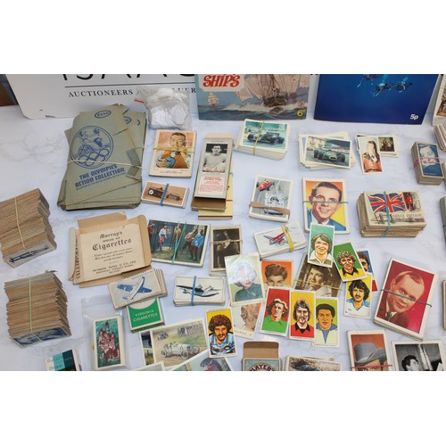 244 - A Quantity Of Cigarette Cards, Postcards Etc As Found