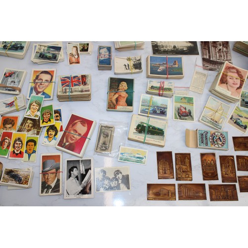 244 - A Quantity Of Cigarette Cards, Postcards Etc As Found