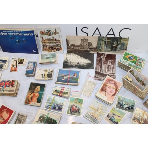 244 - A Quantity Of Cigarette Cards, Postcards Etc As Found