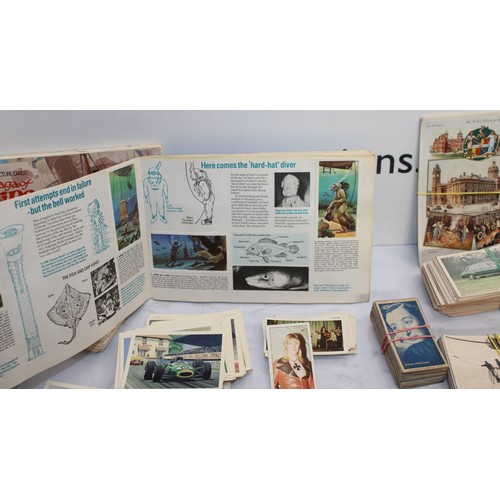 244 - A Quantity Of Cigarette Cards, Postcards Etc As Found