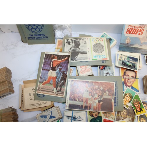 244 - A Quantity Of Cigarette Cards, Postcards Etc As Found