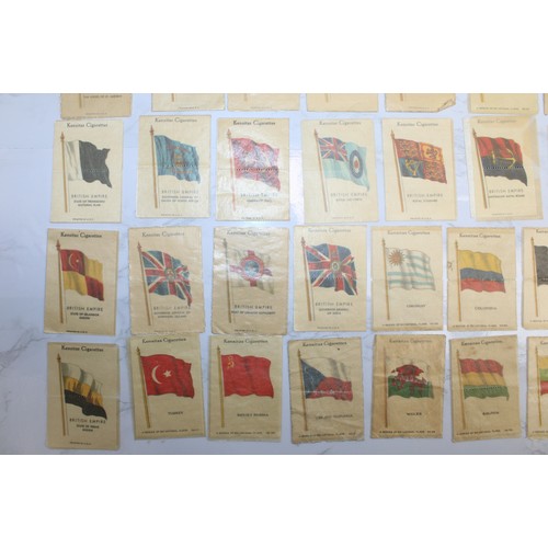 245 - A Quantity Of Vintage Kensitas Cigarette Silk Cards Approximately 70, Depicting World Flags  As Foun... 