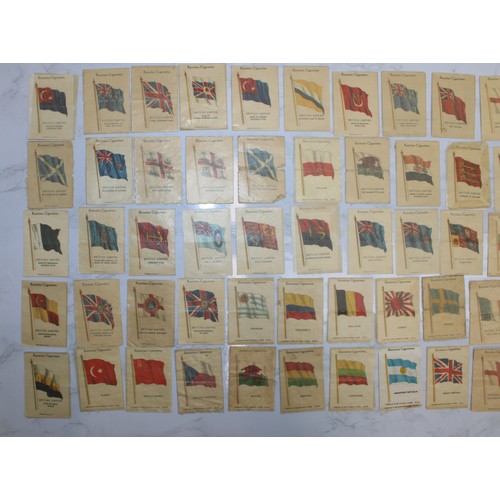 245 - A Quantity Of Vintage Kensitas Cigarette Silk Cards Approximately 70, Depicting World Flags  As Foun... 