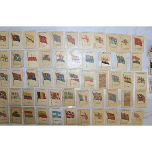 245 - A Quantity Of Vintage Kensitas Cigarette Silk Cards Approximately 70, Depicting World Flags  As Foun... 