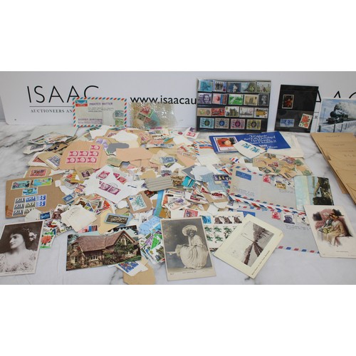 230 - A Quantity Of Worldwide Stamps, Postcards ETC As Found