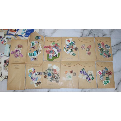 230 - A Quantity Of Worldwide Stamps, Postcards ETC As Found