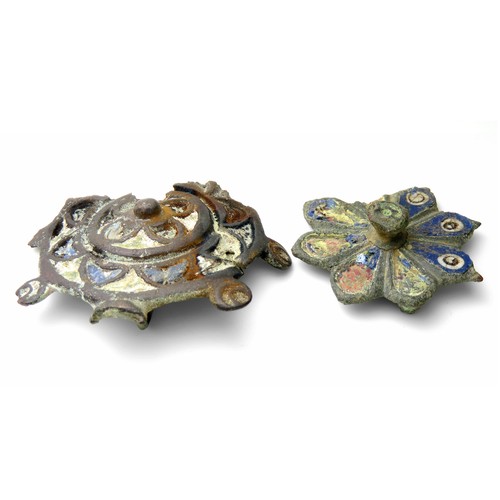 28 - Roman enamelled bronze plate brooches. An umbonate plate brooch and an octofoil plate brooch both ci... 