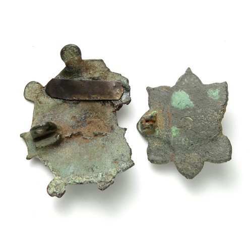 28 - Roman enamelled bronze plate brooches. An umbonate plate brooch and an octofoil plate brooch both ci... 