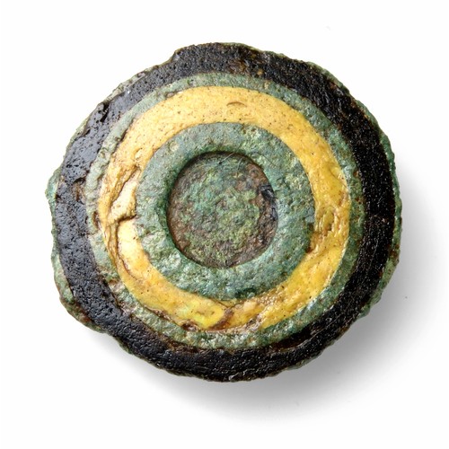 37 - Roman enamelled bronze disc brooch, the front face decorated  with concentric circles of black and y... 