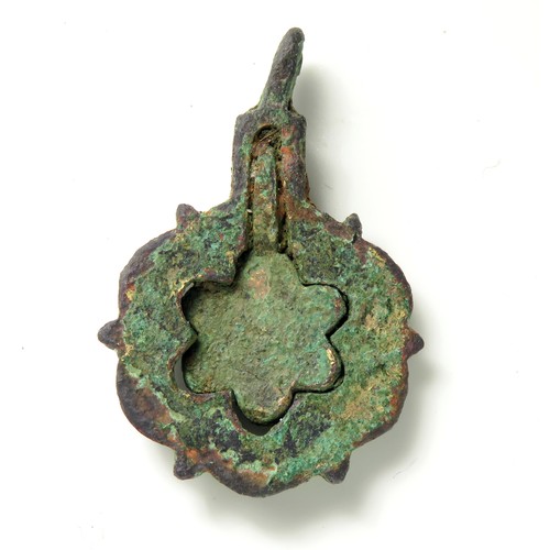 61 - Medieval horse harness pendant with swinger. A bronze harness pendant in the form of an open-frame b... 