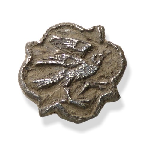 69 - Medieval silver heraldic mount in the form of a barbed quatrefoil with a central device of a bird wa... 