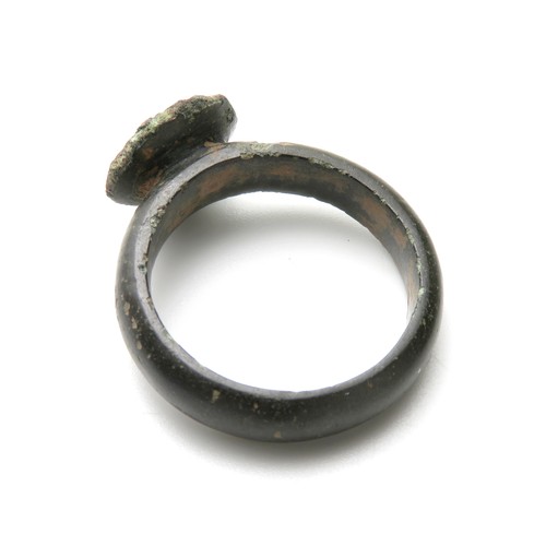 77 - Medieval bronze seal ring, the circular bezel engraved with a crowned letter R. 26mm diameter x 30mm... 