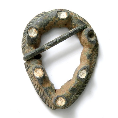 88 - Medieval turreted brooch. Circa, 13th-14th century AD. Copper-alloy, 27mm x 20mm, 4.7g. An annular b... 