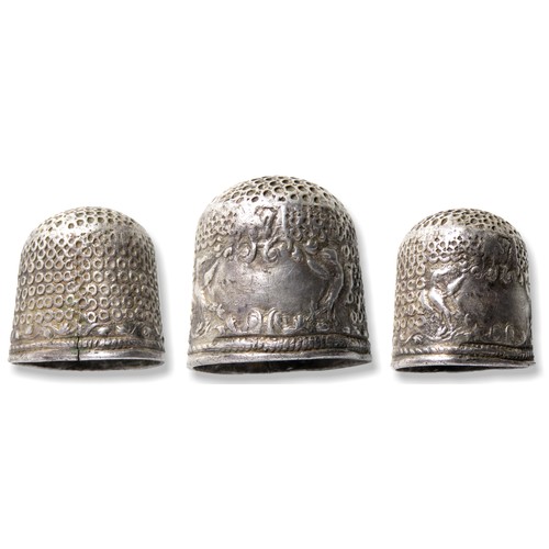 130 - Silver thimble. Circa, 18th century AD. Silver, 4.0 grams. 18mm x 17mm. A short two piece thimble wi... 