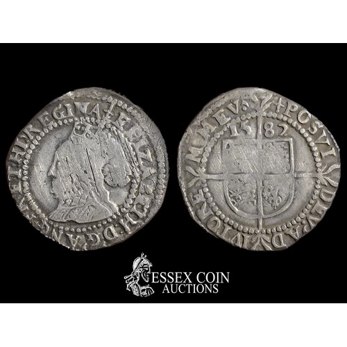 304 - Elizabeth I Silver Threepence, Fifth Issue, 1582. Silver, 1.36 grams, 18.80 mm. Obverse: Crowned lef... 