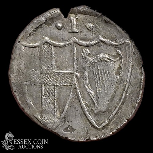 338 - Commonwealth Penny, 1649-60. Silver, 0.47 grams. 12.90 mm. Shield enclosing st Georges cross within ... 