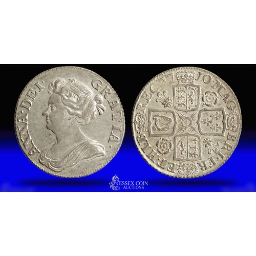 Anne Shilling, post union dated 1710.Silver, 6.02 grams. 24.59 mm. Obv: Draped bust of Queen Anne left, +ANNA DEI GRATIA. Rev: Crowned cruciform shields around central Garter star, roses and plumes in angles, +MAG BRI FR ET HIB REG 1710. 3rd bust. Type N. GEF. Ref: S.3614.