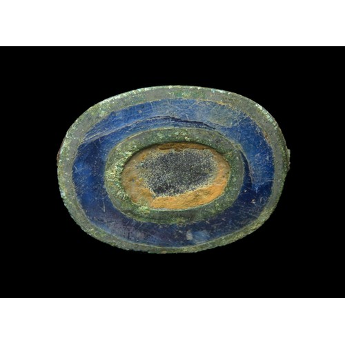 22 - Roman enamelled oval plate brooch, 2nd century AD. Copper-alloy, 25mm x 21mm, 5.5g. Retaining most o... 