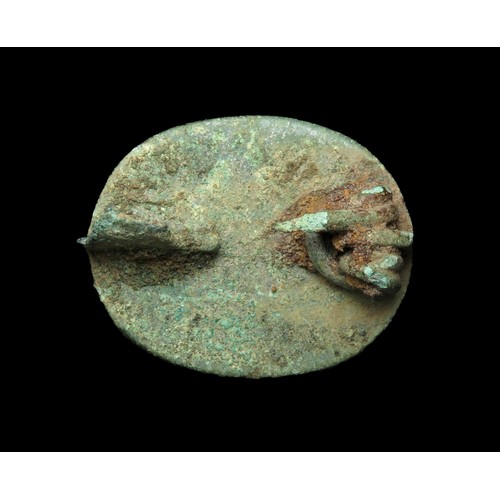 22 - Roman enamelled oval plate brooch, 2nd century AD. Copper-alloy, 25mm x 21mm, 5.5g. Retaining most o... 