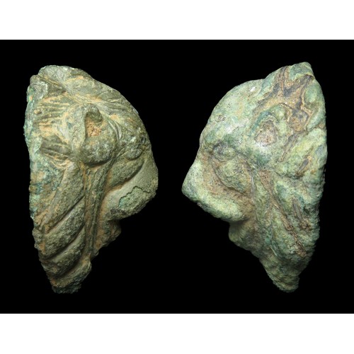 35 - Roman bronze lion head pair. Circa 1st-2nd century AD. Copper-alloy, 33mm x 28mm & 33mm x 25mm. ... 