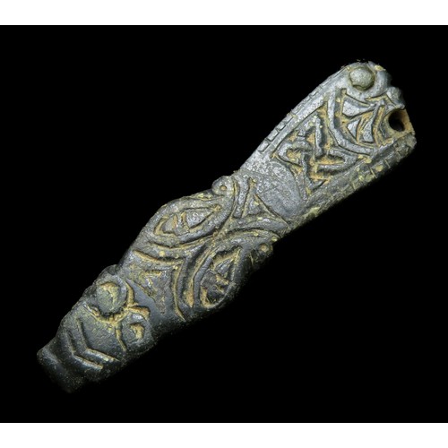 61 - Anglo-Saxon zoomorphic strap end. Circa 9th century AD. Copper-alloy, 43mm x 11mm, 6.9g. Detailed wi... 