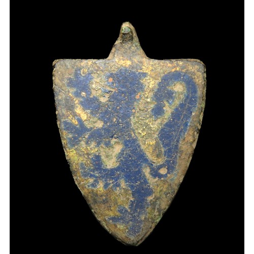 64 - Medieval heraldic pendant. Circa 13th-14th century AD. Copper-alloy, 36mm x 25mm, 9.3g. A shield-sha... 