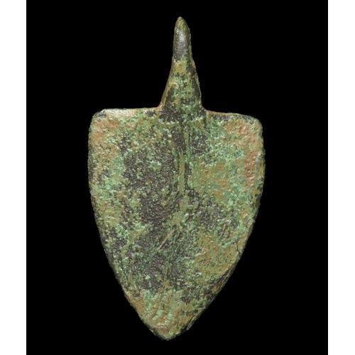 72 - Medieval heraldic pendant. Circa 13th century AD. Copper-alloy, 49mm x 26mm, 11.9g. A shield-shaped ... 