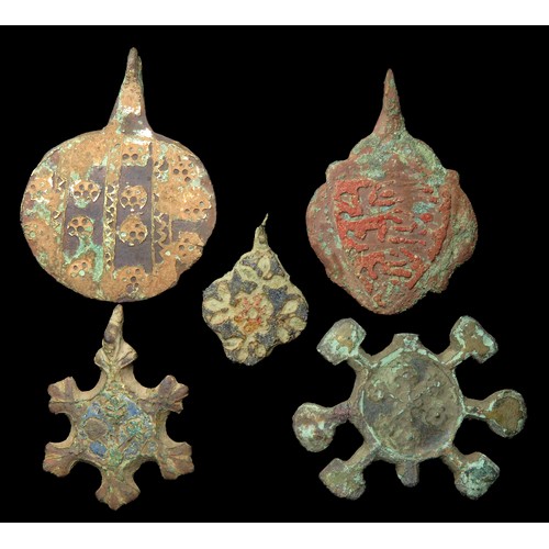 77 - Medieval heraldic pendant group. Circa, 13th-15th century AD. Copper-alloy, Largest 45mm x 35mm. A s... 