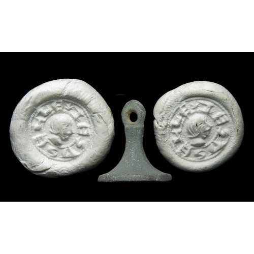 81 - Medieval chessman type seal matrix having a tapering hexagonal-sectioned handle and a circular seal ... 