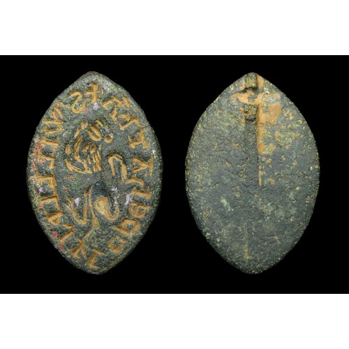 82 - Medieval bronze seal matrix. Circa 13th-14th century AD. Copper-alloy, 6.4g. 31.00 mm. The central d... 