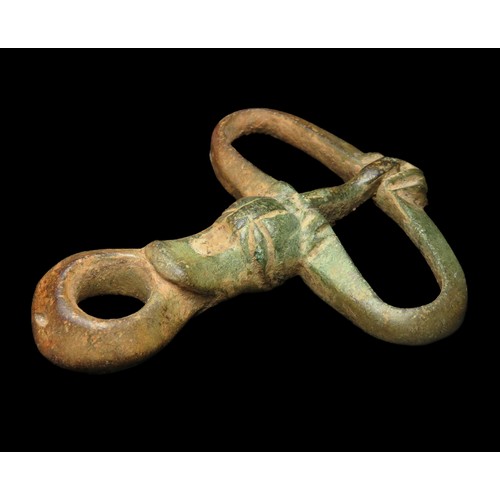 90 - Norman zoomorphic hunting leash buckle. Circa 12th century AD. Copper-alloy, 45mm x 37mm, 14.7g. The... 